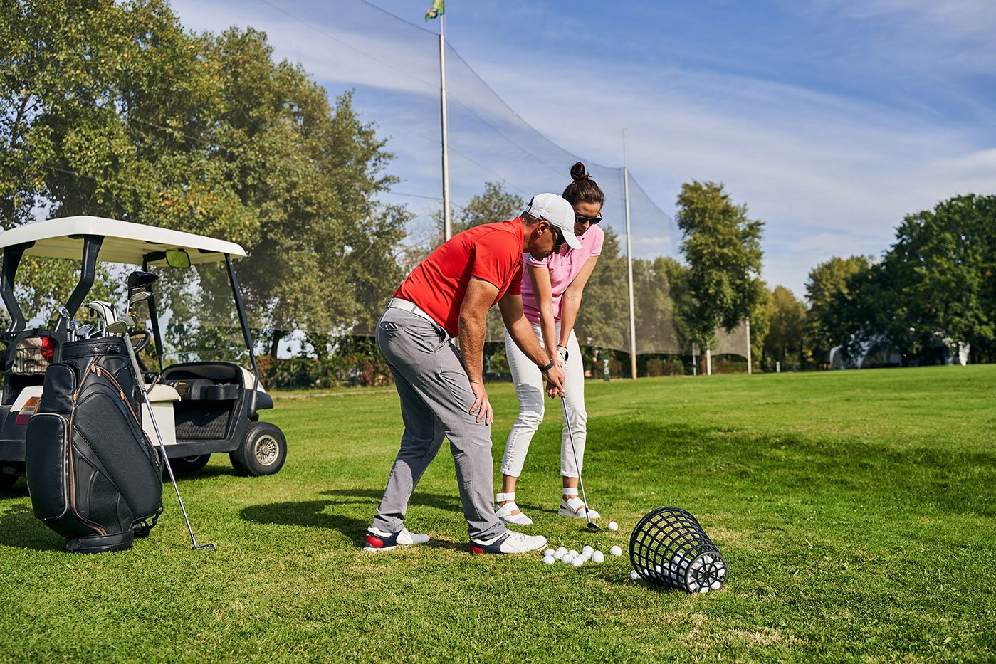 instructor teaching his client a proper putting st 2023 11 27 04 51 01 utc